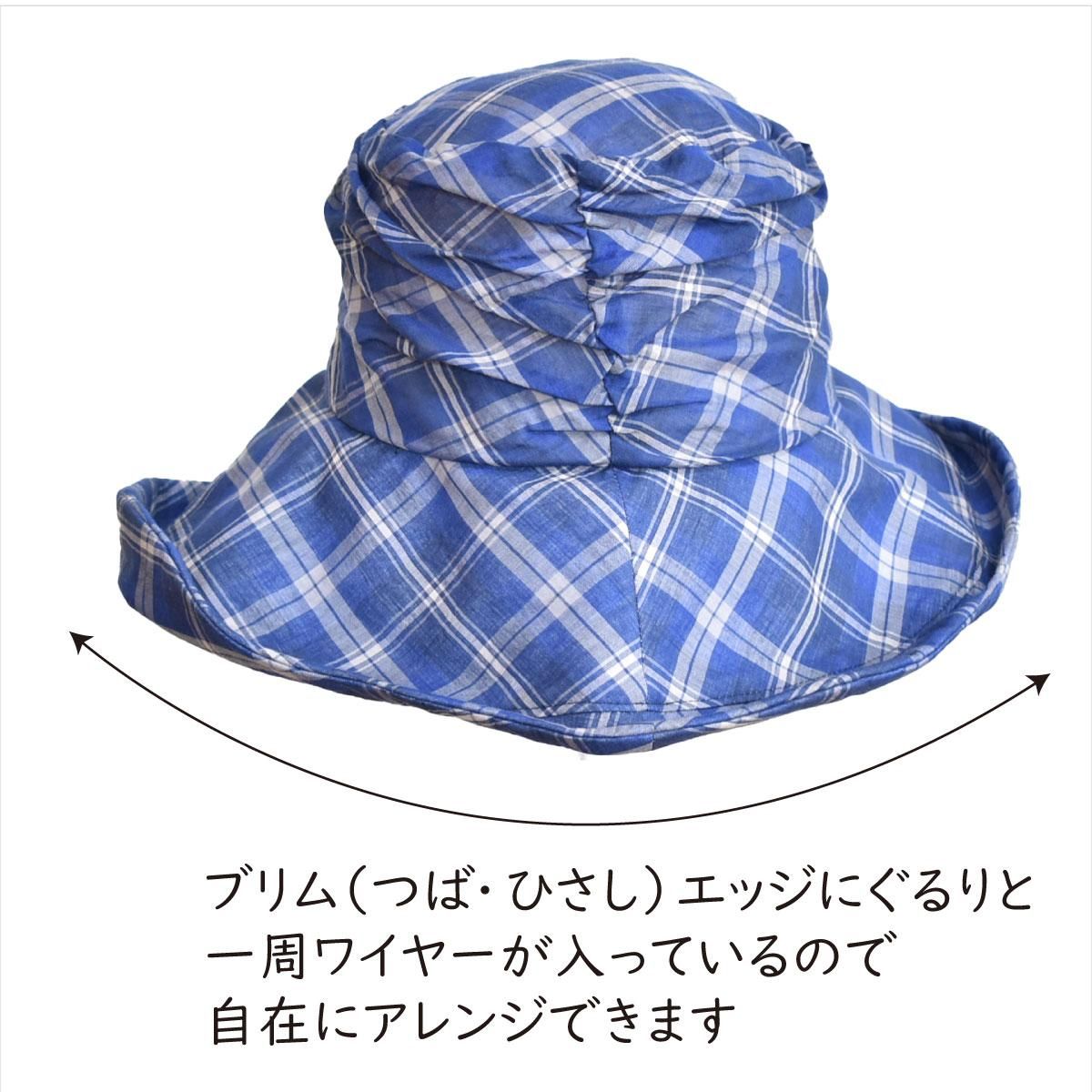 アシンメトリーヘムキャペリーヌ。爽やかなブルーのチェックのPeachBloomオリジナルデザインのキャペリーヌ(つば広帽子)。柔らかい素材のドレープ感とブリム(つば・ひさし)エッジの自在なアレンジで夏にピッタリの帽子。【PS0707】