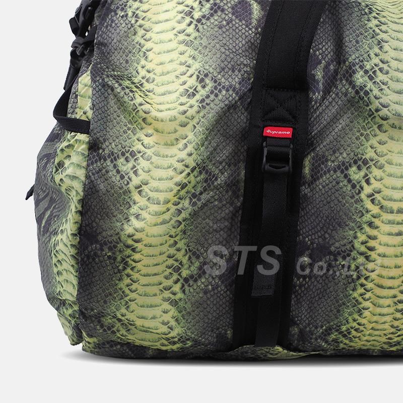 Supreme north face duffel best sale bag snakeskin