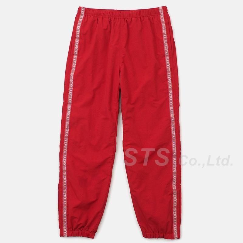 red supreme pants